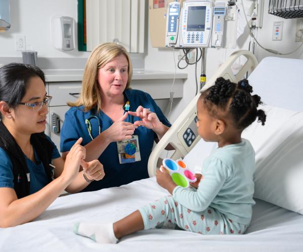 Care team with a young patient at Connecticut Children's